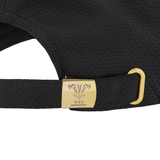 A close-up view of the adjustable strap on the Wales 24/25 Baseball Cap by Macron showcases a gold metal clasp adorned with the WRU logo. Recently released by Macron, this chic accessory combines both elegance and practicality.