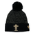 Introducing the Wales 24/25 Black Pom Pom Beanie by Macron: A stylish black knit beanie adorned with the iconic Wales crest and a playful pom-pom, enhanced by a patterned design. Perfect for showing your support, this accessory is both cozy and fashionable.