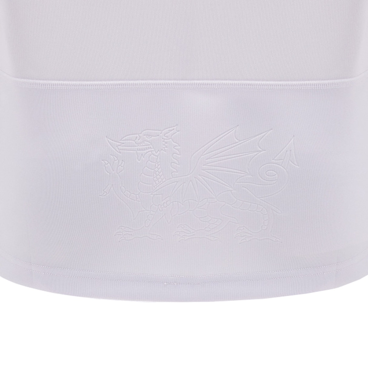 White fabric with an embossed dragon emblem in the center, reminiscent of a classic design featured in the Wales 24/25 6 Nations Replica Away Jersey by Macron.