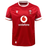 This bold red Wales 24/25 6 Nations Replica Home Jersey by Macron, made from EcoFightex fabric, showcases white accents, the Vodafone logo, and the Welsh Rugby Union emblem on the chest. As an integral piece of the Wales Rugby collection, this jersey embodies both exceptional performance and national pride.