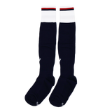 The USA Rugby 24/25 Player Home Socks by Macron are black knee-high rugby socks featuring white cuffs and a thin red stripe near the top, displayed on a plain white background.