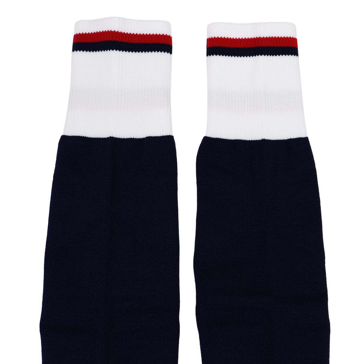 The USA Rugby 24/25 Replica Home Socks by Macron are navy blue with white cuffs featuring red and black stripes at the top, shown laid flat side by side on a white background.