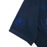 Close-up of the Scotland Rugby Union 1925 100th Anniversary Authentic Home Jersey by Macron, showing a navy sleeve with embroidered thistle emblem and geometric cuff trim, celebrating the centenary.