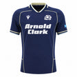 Introducing the Scotland SRU 26/27 Authentic Matchday Home Jersey by Macron—a navy blue jersey featuring the iconic white "Arnold Clark" sponsor, thistle crest, Macron logo, and Scottish flag on the sleeve. This authentic matchday shirt is perfect for fans seeking official team apparel.