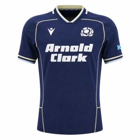 Introducing the Scotland SRU 26/27 Authentic Matchday Home Jersey by Macron—a navy blue jersey featuring the iconic white "Arnold Clark" sponsor, thistle crest, Macron logo, and Scottish flag on the sleeve. This authentic matchday shirt is perfect for fans seeking official team apparel.