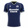 Introducing the Scotland SRU 26/27 Authentic Matchday Home Jersey by Macron—a navy blue jersey featuring the iconic white "Arnold Clark" sponsor, thistle crest, Macron logo, and Scottish flag on the sleeve. This authentic matchday shirt is perfect for fans seeking official team apparel.