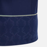 Close-up of a navy blue fabric from the Scotland SRU 26/27 Replica Home Jersey by Macron, featuring a subtle antler pattern and a horizontal beige stitched seam across the middle.