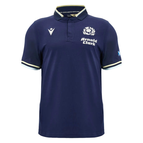 Introducing the Scotland SRU 26/27 Cotton Replica Home Jersey by Macron—a navy blue short-sleeve rugby polo shirt featuring the official Scotland rugby logo, "Arnold Clark" text, and crisp white trim on the collar and sleeves. Crafted from premium cotton, this replica home jersey captures authentic team style from renowned brand Macron.
