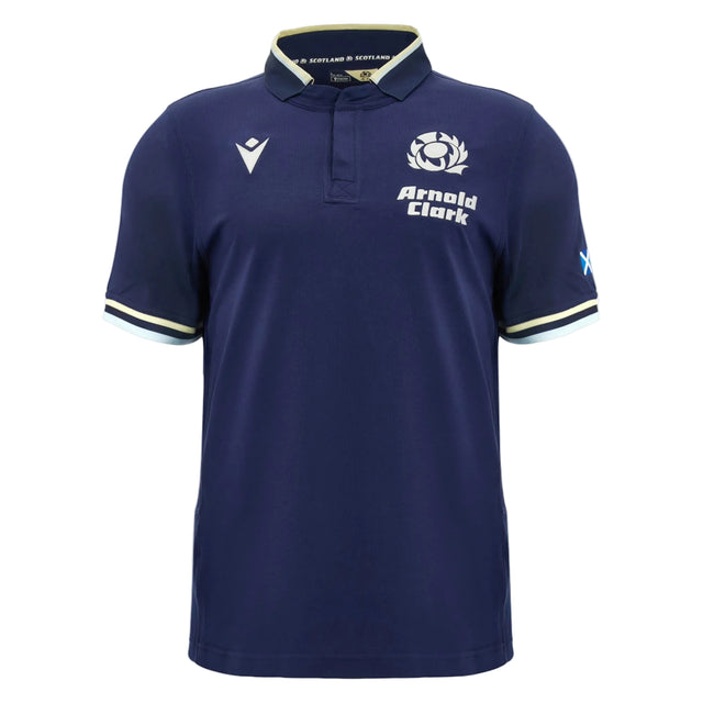 Introducing the Scotland SRU 26/27 Cotton Replica Home Jersey by Macron—a navy blue short-sleeve rugby polo shirt featuring the official Scotland rugby logo, "Arnold Clark" text, and crisp white trim on the collar and sleeves. Crafted from premium cotton, this replica home jersey captures authentic team style from renowned brand Macron.