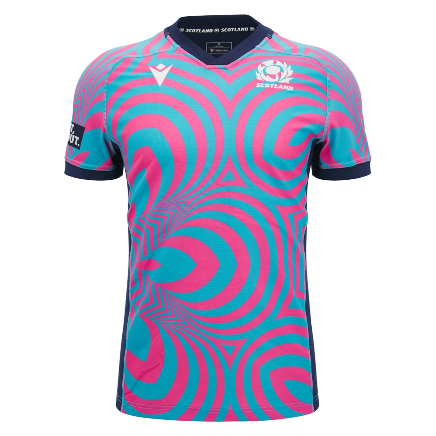 The Scotland SRU 26/27 Replica Training Jersey by Macron features blue and pink concentric circle patterns, a navy collar and sleeve trim, and prominently displays the Scotland Rugby logo on the chest. Crafted by Macron, it’s perfect for fans looking for an authentic Scotland Rugby Jersey look.