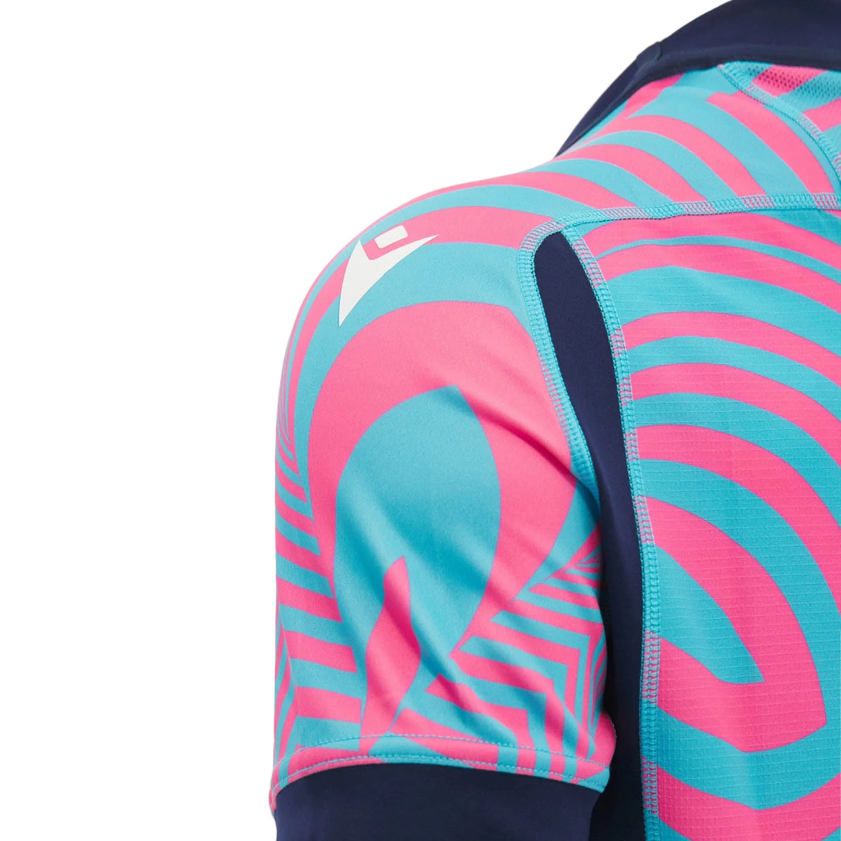 Close-up of a person's shoulder wearing the Scotland SRU 26/27 Replica Training Jersey by Macron, showcasing its blue and pink geometric patterns and the white Macron logo on the sleeve, which highlight the distinctive style of this official training top.