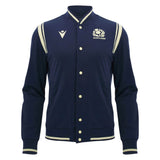 The Scotland SRU 26/27 Anthem Varsity Jacket by Macron features a navy blue design with cream trim, button closure, and the Scotland Rugby team logo on the left chest.