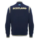 Here’s your rewritten sentence using the provided product data: The Scotland SRU 26/27 Anthem Varsity Jacket by Macron is shown from the back in navy blue, featuring "SCOTLAND" in large white letters with a small Scottish flag above the text near the collar, designed in classic varsity style.