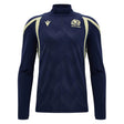 Introducing the Scotland SRU 26/27 Training 1/4 Zip by Macron—a navy blue long-sleeve training top featuring cream accents, a Macron quarter-zip, and the Scottish Rugby Union emblem on the left chest.