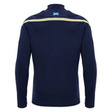 The Scotland SRU 26/27 Training 1/4 Zip by Macron is pictured from the back, featuring a navy long-sleeve design with a small Scottish flag at the upper center and contrasting accents across the shoulders—this official training top from Macron combines a sleek 1/4 zip style, making it an ideal choice for fans of the Scottish Rugby Union.