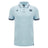 Introducing the Scotland SRU 26/27 Travel Polo by Macron—a light blue short-sleeve polo featuring a collar, button placket, dark trim on the sleeves, and two embroidered logos on the chest.