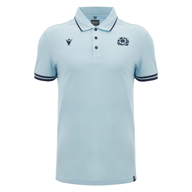 Introducing the Scotland SRU 26/27 Travel Polo by Macron—a light blue short-sleeve polo featuring a collar, button placket, dark trim on the sleeves, and two embroidered logos on the chest.