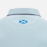Close-up of the back collar of the Scotland SRU 26/27 Travel Polo by Macron in light blue, featuring a small Scotland flag patch below the collar.