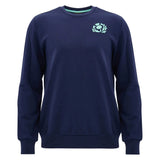 The Scotland SRU 26/27 Leisure Sweatshirt by Macron features a navy blue crewneck design with a light blue emblem on the left chest, inspired by the Scotland Rugby sweatshirt collection, and is presented against a plain white background.