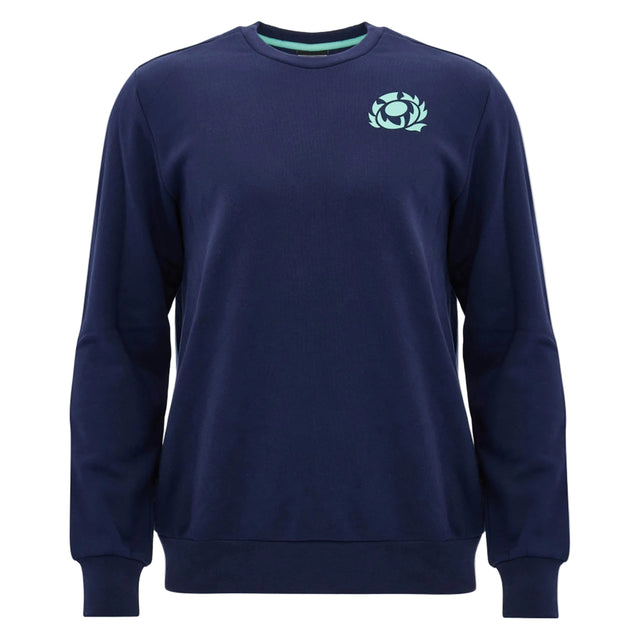 The Scotland SRU 26/27 Leisure Sweatshirt by Macron features a navy blue crewneck design with a light blue emblem on the left chest, inspired by the Scotland Rugby sweatshirt collection, and is presented against a plain white background.