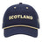 The Scotland SRU 26/27 Dad Cap by Macron features a navy blue design with "SCOTLAND" embroidered in beige letters on the front and coordinating beige trim along the brim—an ideal choice for any Scotland Rugby fan eager to support their team in official SRU 26/27 style.