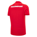 Red short-sleeved sports jersey shown from the back, featuring “GO.COMPARE” in white text across the shoulders. This is the Wales WRU 26/27 Authentic Matchday Home Jersey by Macron.