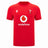 Experience the official Wales WRU 26/27 Authentic Matchday Home Jersey by Macron—crafted in striking red, it showcases a bold white Vodafone logo, white Macron branding, and a chest crest featuring the iconic white feather emblem with “WRU” text.