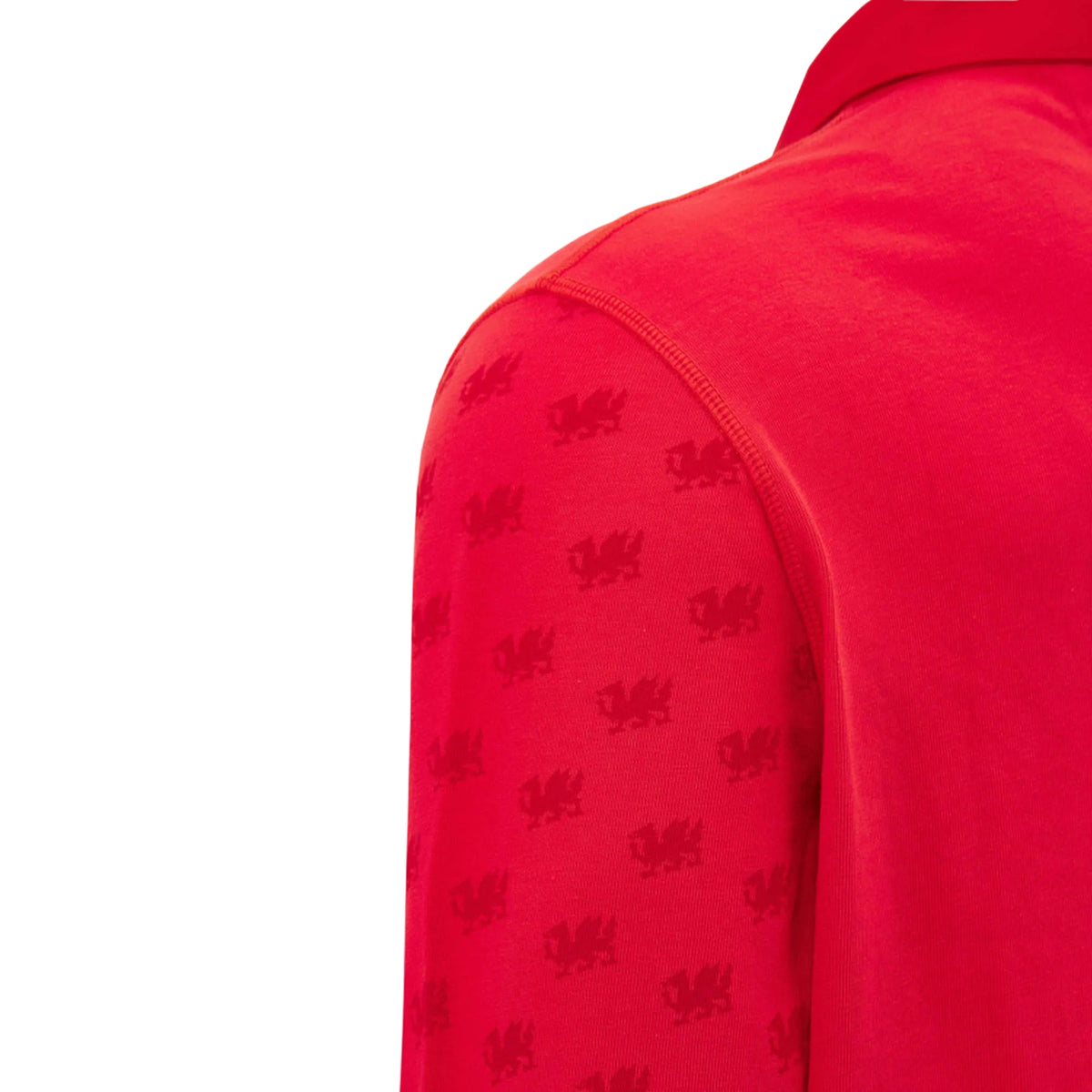 Close-up of the Wales WRU 26/27 Classic Long Sleeve Home Jersey by Macron, showcasing a red design with a pattern of small dragon-like emblems inspired by the iconic Wales rugby jersey.