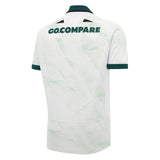 The Wales WRU 26/27 Replica Away Jersey by Macron is a white short-sleeved sports jersey inspired by the iconic Wales WRU kit, featuring a dark green collar and sleeve trim, with “GO.COMPARE” printed on the upper back.