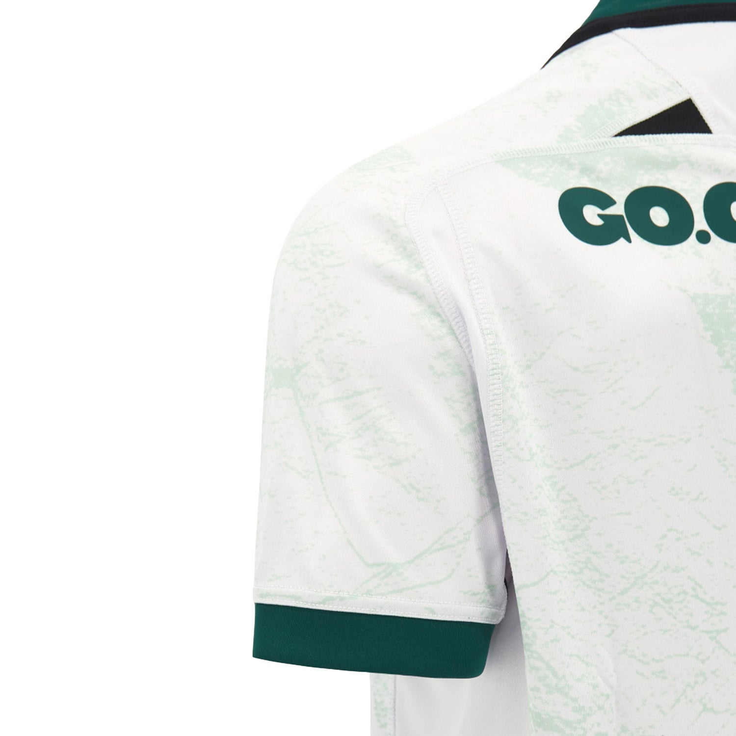 Close-up of the back of the white Wales WRU 26/27 Replica Away Jersey by Macron, showing green collar and sleeve trim, with partial green “GO.CO” text near the shoulder.