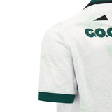 Close-up of the back of the white Wales WRU 26/27 Replica Away Jersey by Macron, showing green collar and sleeve trim, with partial green “GO.CO” text near the shoulder.