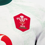 Showcasing the iconic WRU logo with three feathers and the “WRU” initials on a bold red badge, the Wales WRU 26/27 Replica Away Jersey by Macron beautifully embodies Welsh rugby pride. Crafted by Macron, this authentic away shirt is an excellent choice for fans looking for a genuine replica of the official Wales WRU jersey.
