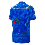 Italy 26/27 Home Authentic Jersey by Macron—a blue soccer jersey featuring an abstract geometric pattern, “FRECCIAROSSA” text on the upper back, and “ITALIA” subtly printed at the lower back—an authentic design inspired by Italy Rugby Jersey style.