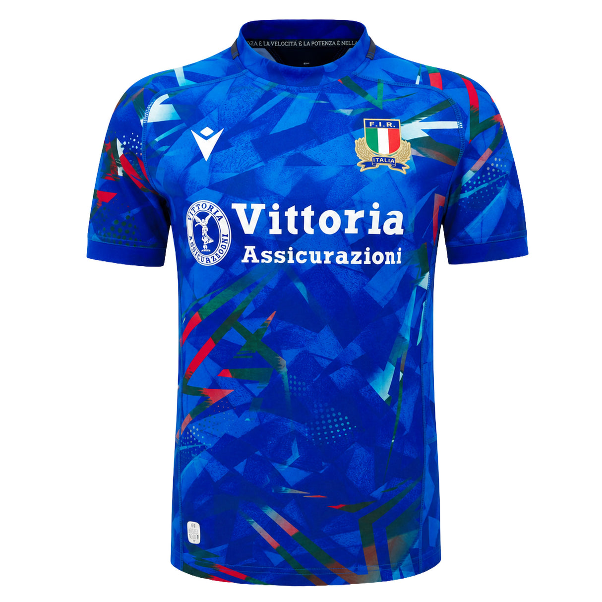The Italy 26/27 Home Replica Jersey by Macron features a blue short-sleeve design with an abstract geometric pattern, the Italian flag badge, sponsor logo “Vittoria Assicurazioni,” and a white Macron brand logo. Inspired by classic Italy Rugby Jersey styles, this jersey embodies both sporty appeal and national pride.