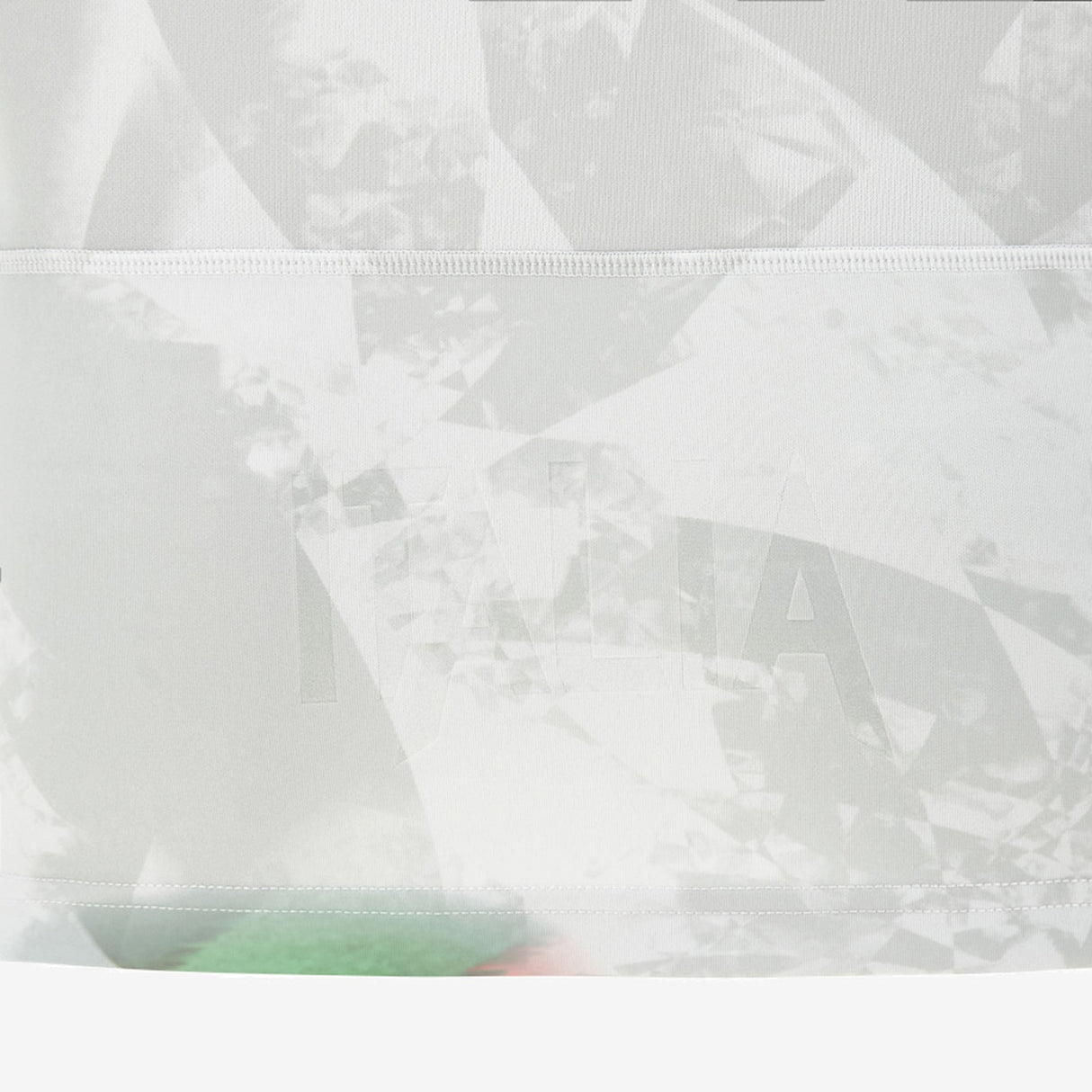 Crafted by Macron, the Italy 26/27 Away Replica Jersey features a white fabric adorned with a subtle geometric pattern and the word “ITALIA” embossed at the center, capturing the refined look of Italy’s official away kit while offering both performance and sustainability.
