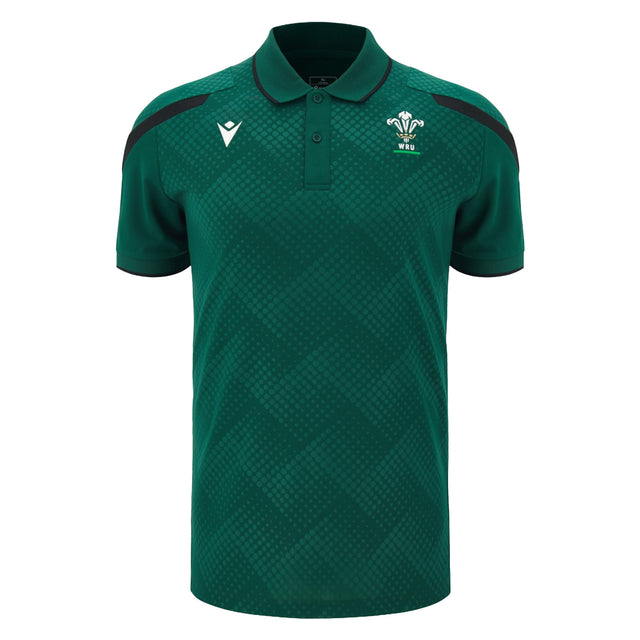 Wales WRU 26/27 Travel Poly Polo by Macron in green, featuring black shoulder accents, white chest logos, and a subtle checkered pattern.