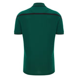 The Wales WRU 26/27 Travel Poly Polo by Macron is a green short-sleeved polo shirt displayed from the back, featuring black detailing on the collar, sleeve edges, and shoulders. Inspired by classic Welsh Rugby Union shirts, this design captures the sporty elegance associated with Wales rugby.