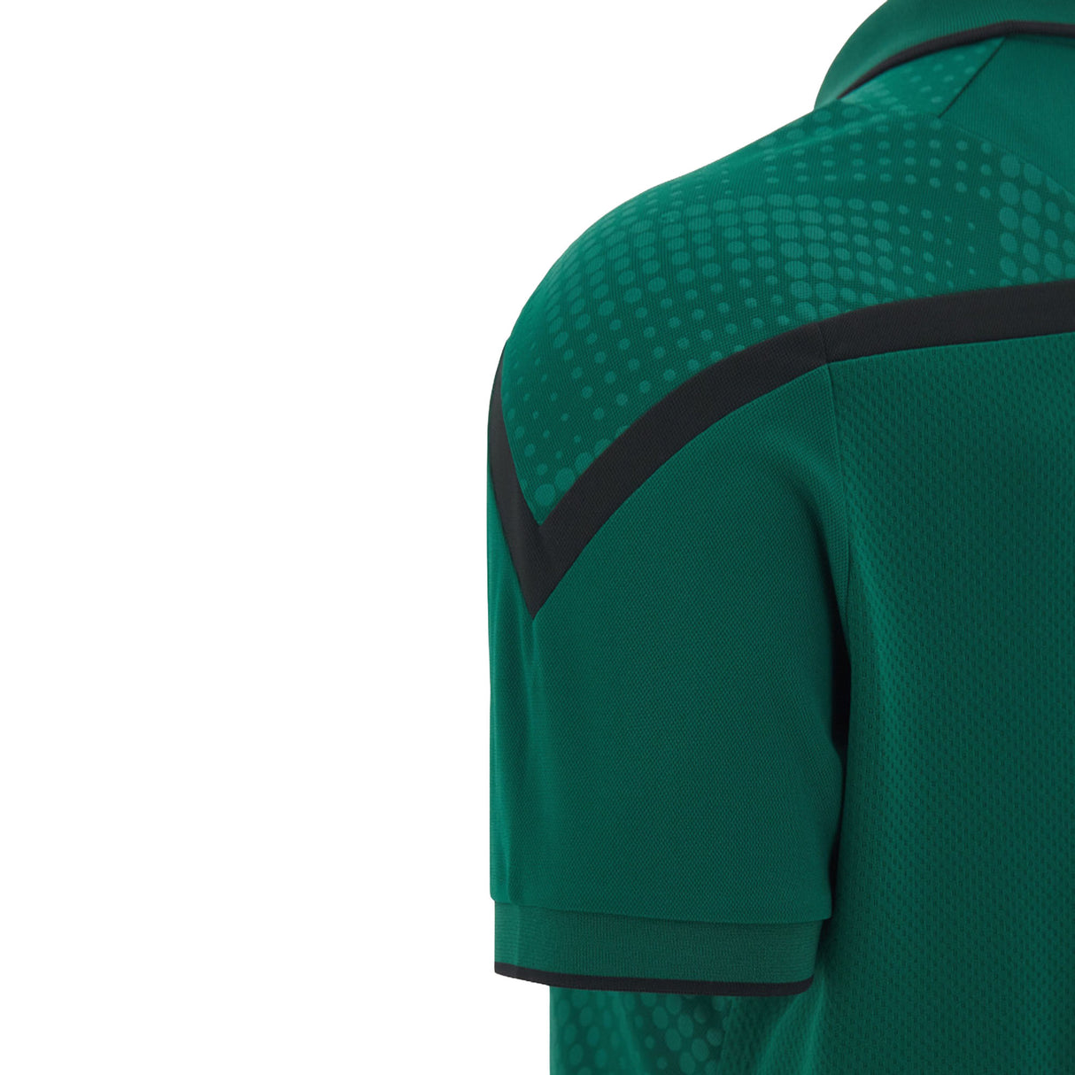 Close-up of the upper back section of the Wales WRU 26/27 Travel Poly Polo by Macron—a green short-sleeve rugby polo featuring a black chevron detail and a dotted pattern on the shoulder.