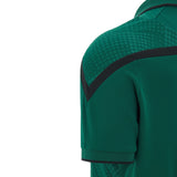 Close-up of the upper back section of the Wales WRU 26/27 Travel Poly Polo by Macron—a green short-sleeve rugby polo featuring a black chevron detail and a dotted pattern on the shoulder.