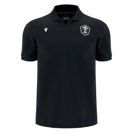 Wales 26/27 Travel Cotton Polo by Macron—this classic black collared short-sleeve shirt features a white crest and subtle Macron logo on the chest, with no visible patterns or text on the main body. Perfect for any fan seeking a stylish and comfortable Wales WRU polo.