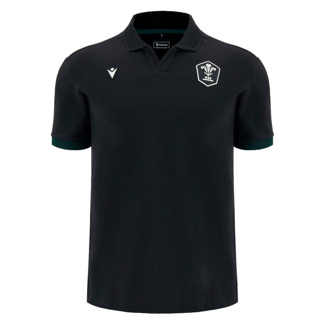 Introducing the Wales WRU 26/27 Travel Cotton Polo by Macron—a black short-sleeve polo shirt crafted from comfortable cotton, designed with a classic collar. It features a white embroidered crest on the left chest and a subtle white Macron logo on the right chest. Inspired by classic Macron rugby shirt styling, this polo embodies timeless team spirit and enduring comfort.