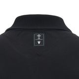 Close-up of the back collar of the black Wales WRU 26/27 Travel Cotton Polo by Macron, featuring a small rectangular label with a crown and chevron design.