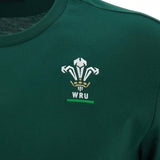 The Wales WRU 26/27 Travel Poly/Cotton T-Shirt by Macron features the Welsh Rugby Union (WRU) logo embroidered in white, gold, and green on the chest. This official Macron t-shirt from the WRU travel collection combines style and comfort for loyal supporters.