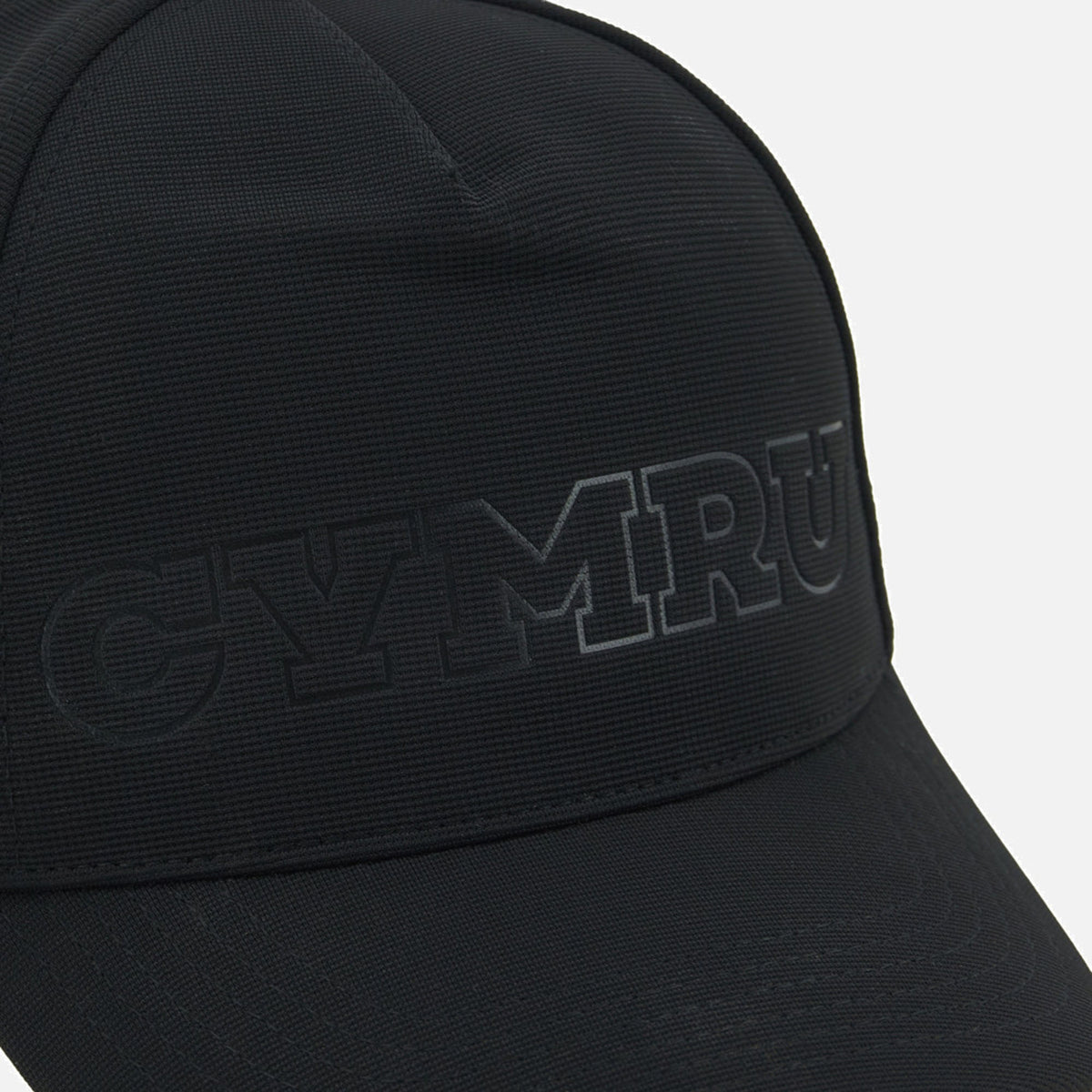 Show your support for Welsh Rugby with the Wales WRU 26/27 Baseball Cap by Macron—a stylish black cap featuring “CYMRU” embossed in large, bold letters on the front from the renowned brand Macron.