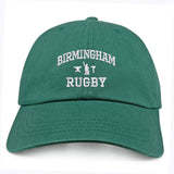 The Birmingham Rugby Text Logo Dad Cap by EMB S&S Activewear features “Birmingham Rugby” embroidered in white on the front along with small icons of a rugby goalpost and player—this classic embroidered team hat is perfect for both fans and players.