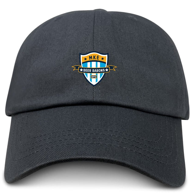The EMB S&S Activewear Milwaukee Beer Barons RFC Adult Low-Profile Cotton Twill Dad Cap is black, with a blue, gold, and white embroidered "MKE Beer Barons GFC" crest on the front.