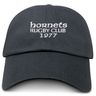 The Hornets Rugby Club 1977 Adult Low-Profile Cotton Twill Dad Cap by EMB S&S Activewear features white embroidered team branding on the front reading "hornets RUGBY CLUB 1977" and is made from black cotton twill.