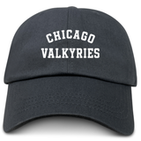 The Chicago Valkyries Adult Low-Profile Cotton Twill Dad Cap by EMB S&S Activewear features "CHICAGO VALKYRIES" embroidered in bold, white capital letters on the front of a classic black cotton twill dad cap—making it the perfect stylish embroidered team hat for fans.