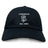 The Amoskeag Rugby Club Adult Low-Profile Cotton Twill Dad Cap by EMB S&S Activewear features “AMOSKEAG” and “Est. 1984” embroidered in white above a ram’s head logo on black cotton twill.