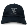 The Amoskeag Rugby Club Adult Low-Profile Cotton Twill Dad Cap by EMB S&S Activewear features “AMOSKEAG” and “Est. 1984” embroidered in white above a ram’s head logo on black cotton twill.